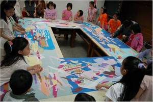 Students depict sky scenes using paper pieces and clippings